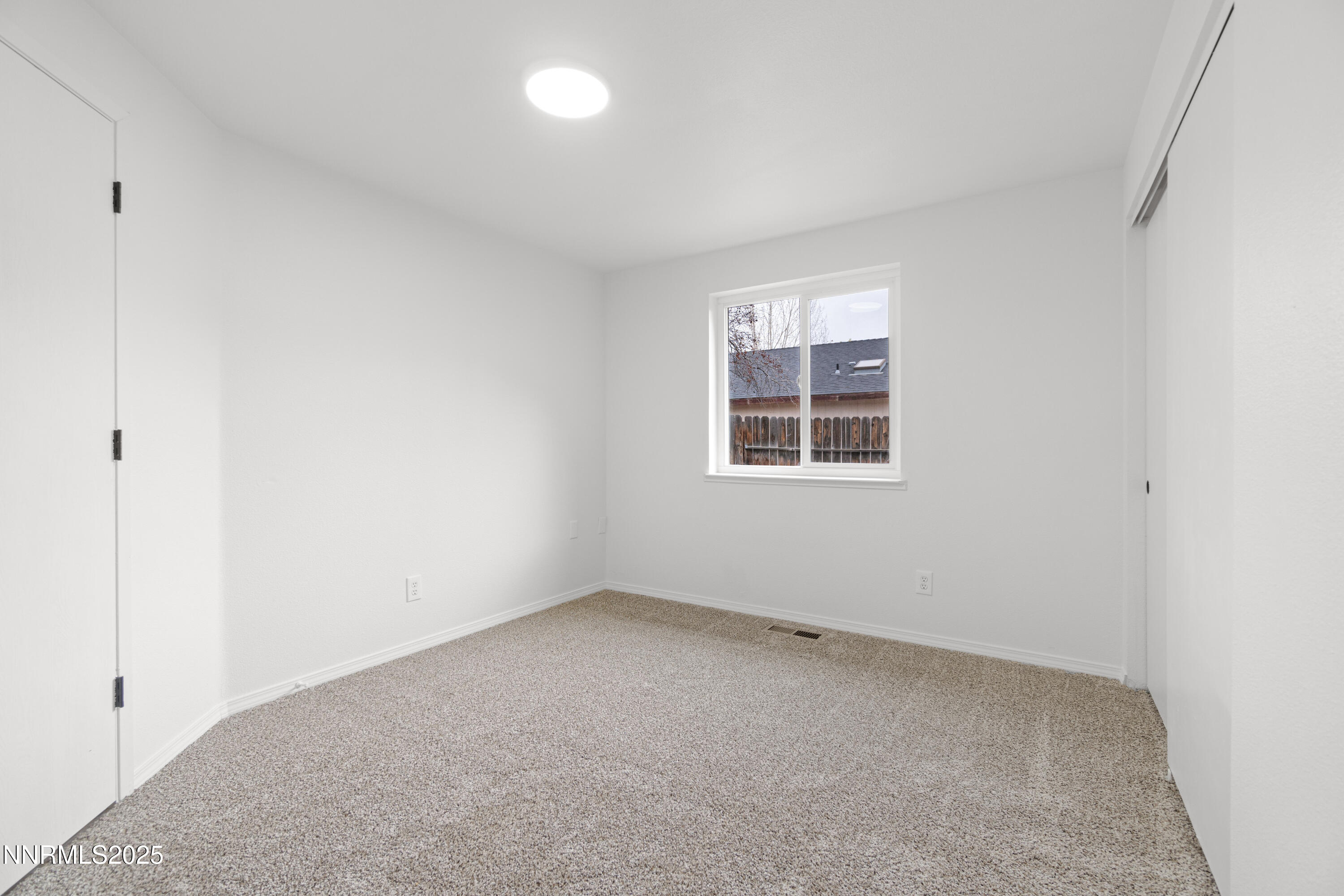 365 Kathy Street Fallon, NV 89406 - Photo 19 of 28 an empty room with a window