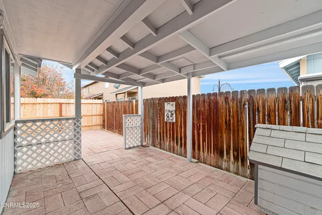 a view of outdoor space with wooden floor