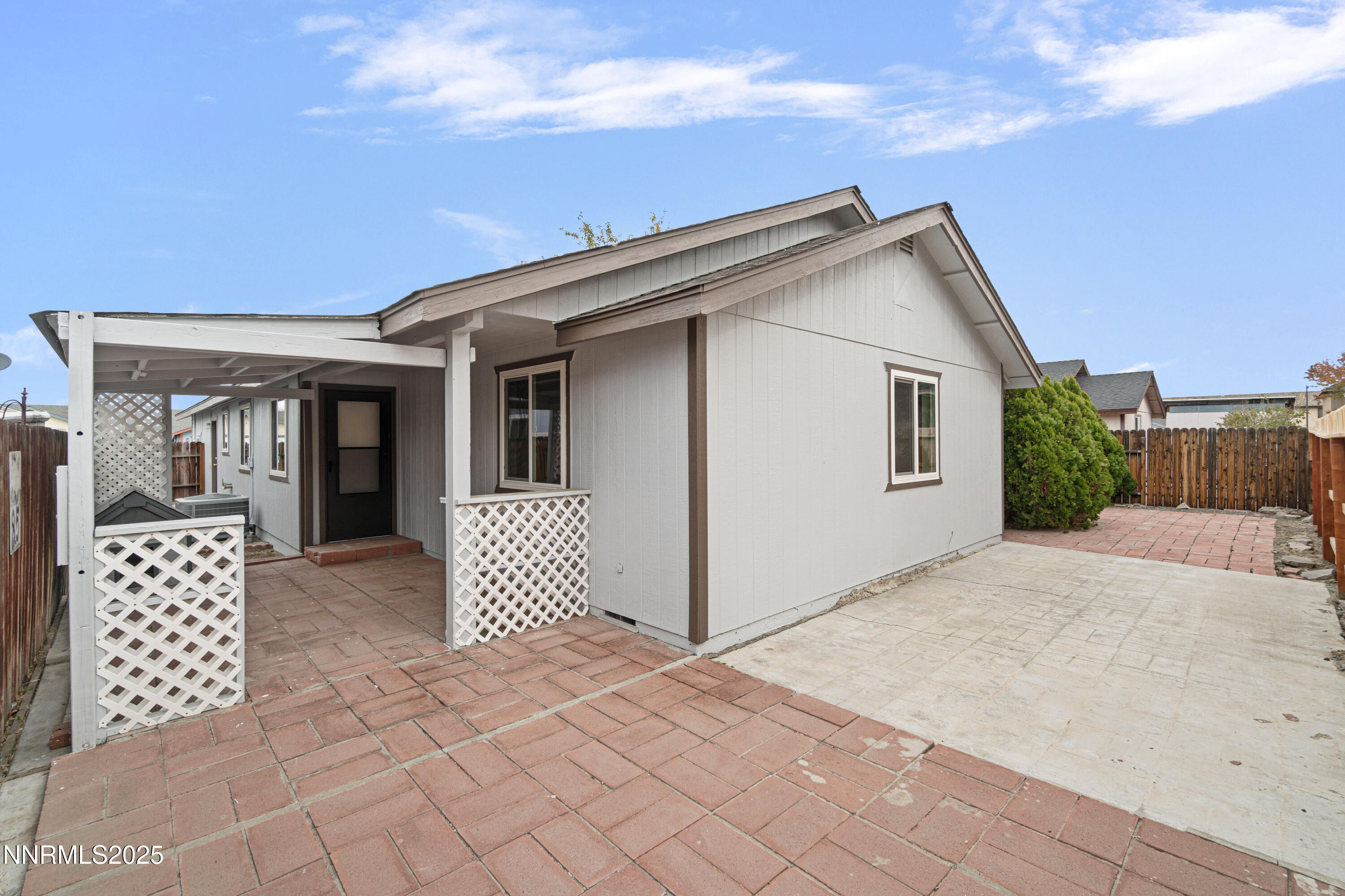 365 Kathy Street Fallon, NV 89406 - Photo 26 of 28 a front view of a house with a garage