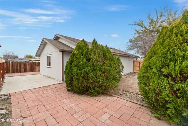 a view of a back yard of the house