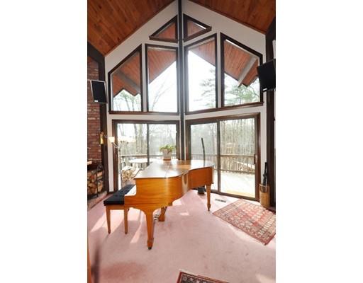 31 Squannacook Road Shirley, MA 01464 - Photo 16 of 22 a living room with a large window and a table
