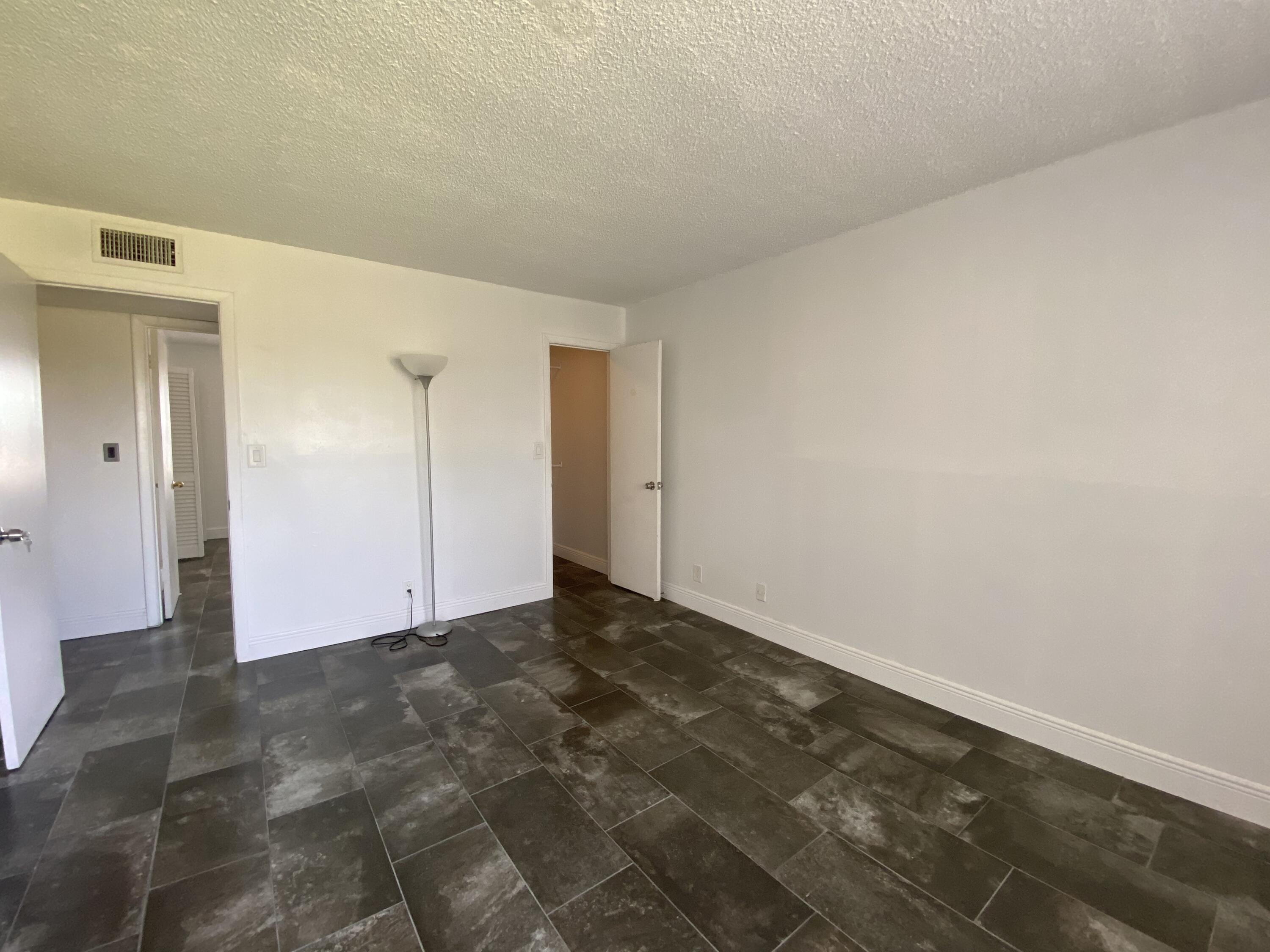 9355 Southwest 8th Street, Unit 305 Boca Raton, FL 33428 - Photo 3 of 13 a view of an empty room