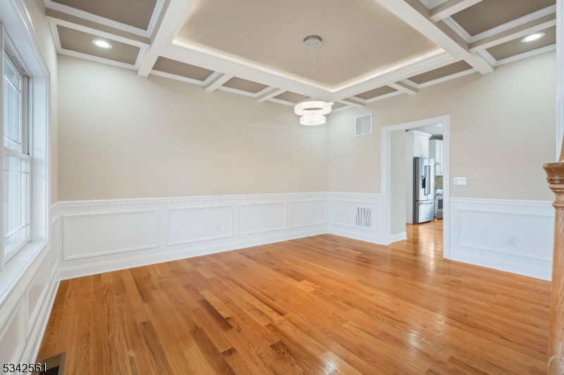 118 Cambridge Road Westfield, NJ 07090 - Photo 5 of 50 a view of an empty room with wooden floor