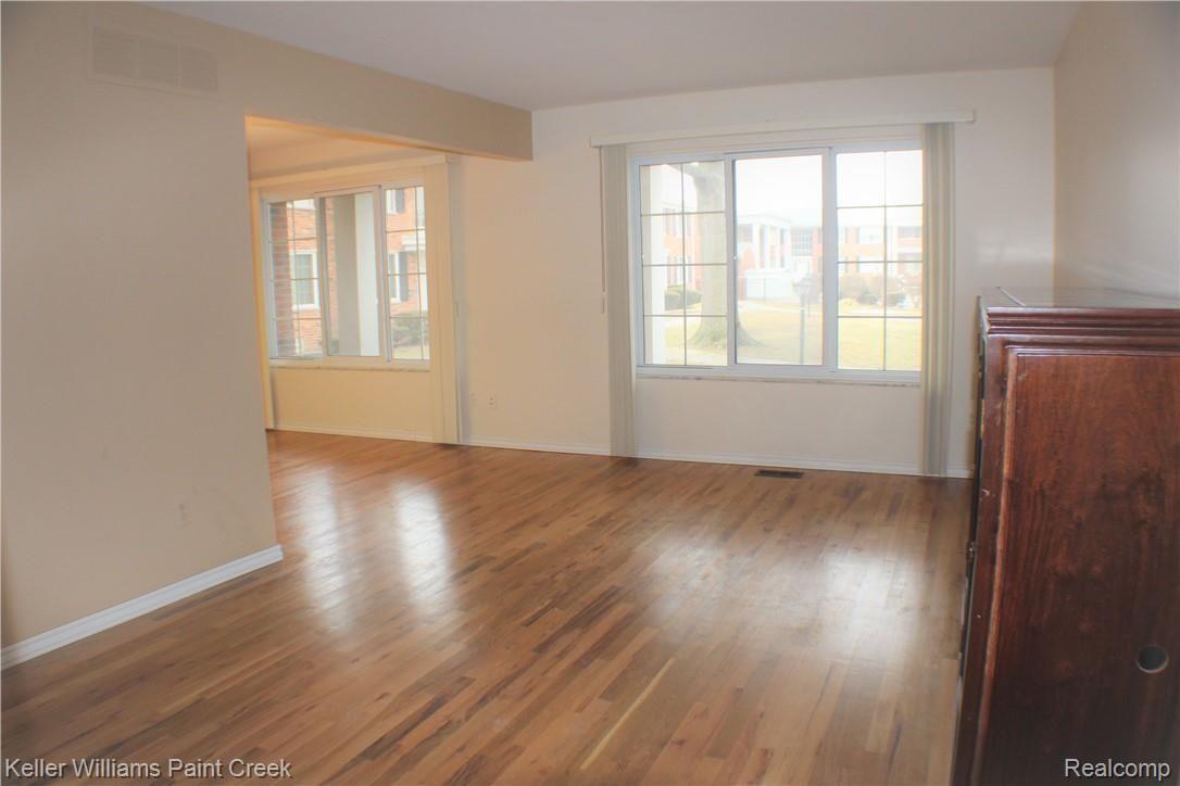 29384 Hoover Road Warren, MI 48093 - Photo 3 of 19 Living room with beautiful hardwood floors