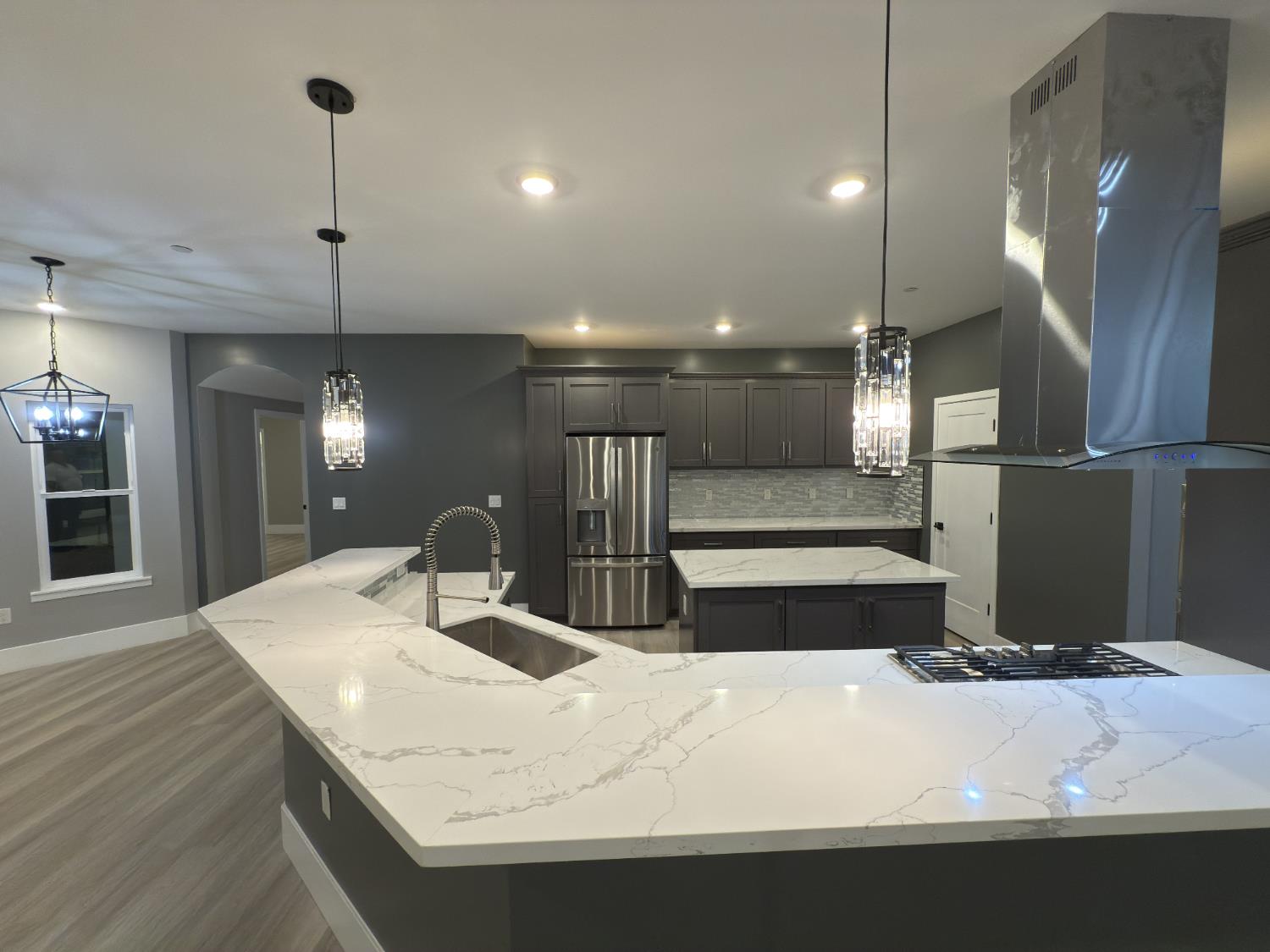 21275 Road 28 1/2 Madera, CA 93638 - Photo 13 of 28 a bathroom with a sink and a large mirror