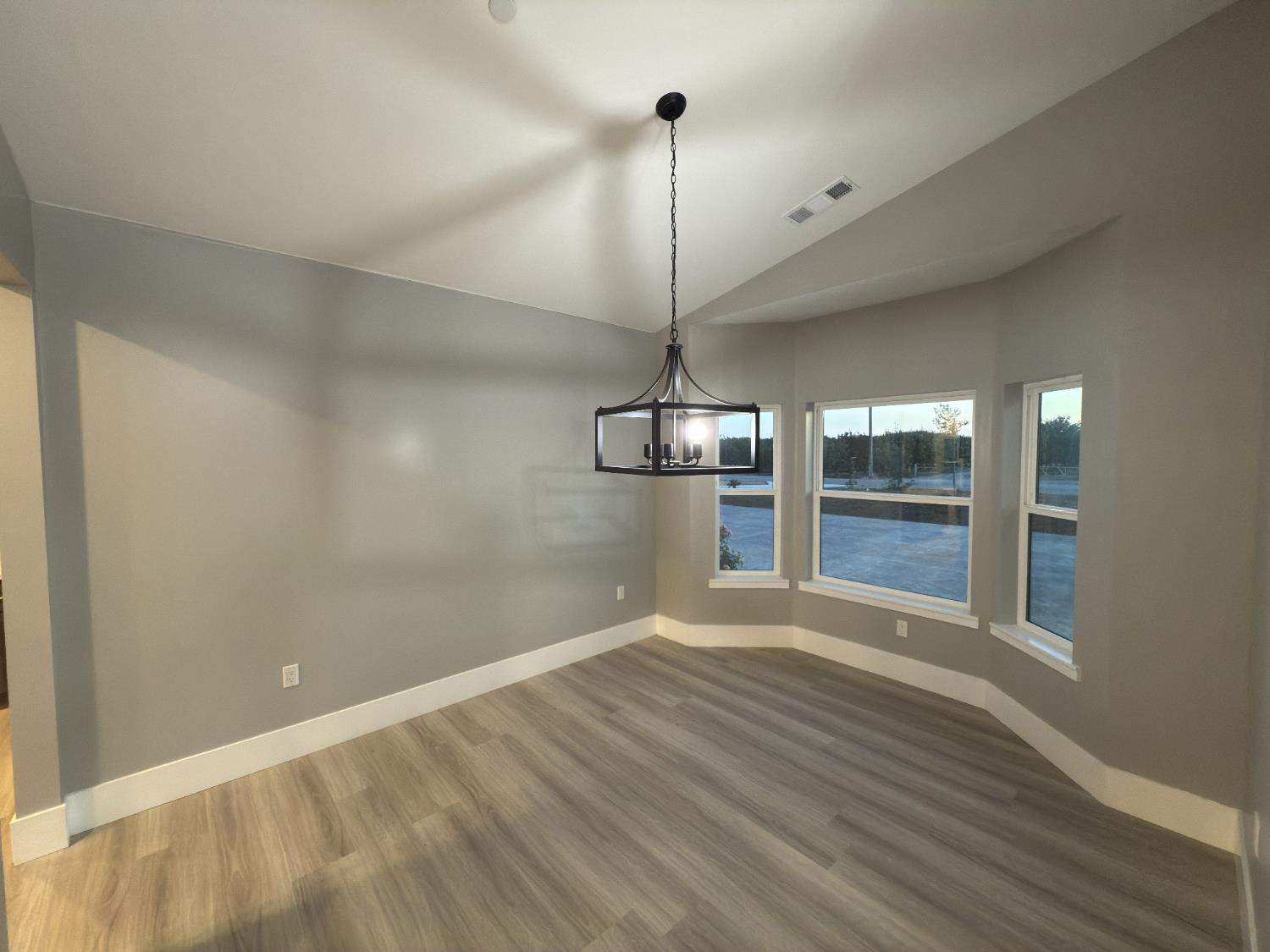 21275 Road 28 1/2 Madera, CA 93638 - Photo 23 of 28 a view of empty room with wooden floor and fan