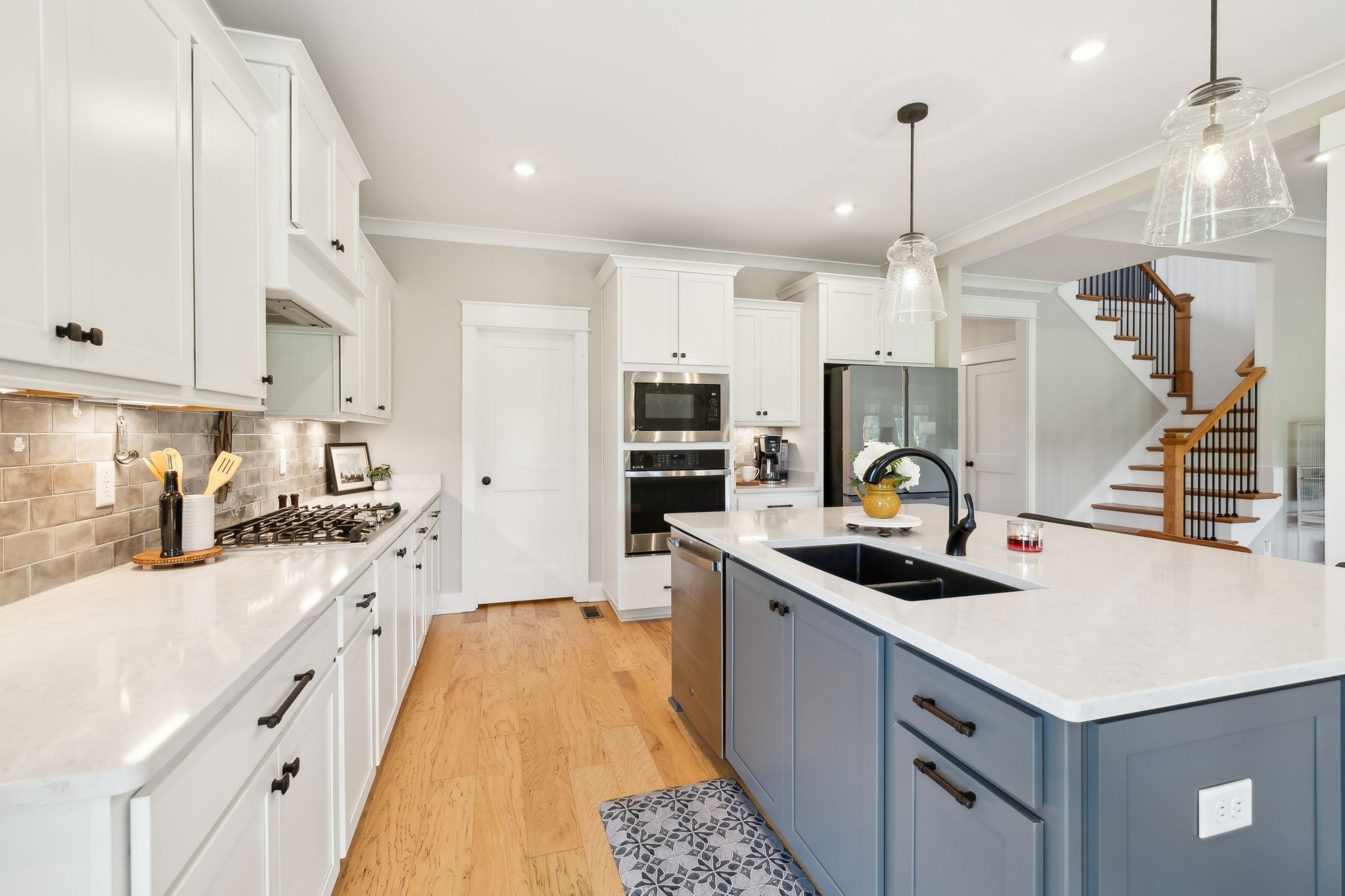 11769 Milton Street Milton, TN 37118 - Photo 15 of 77 a kitchen with stainless steel appliances granite countertop a sink a stove and a refrigerator