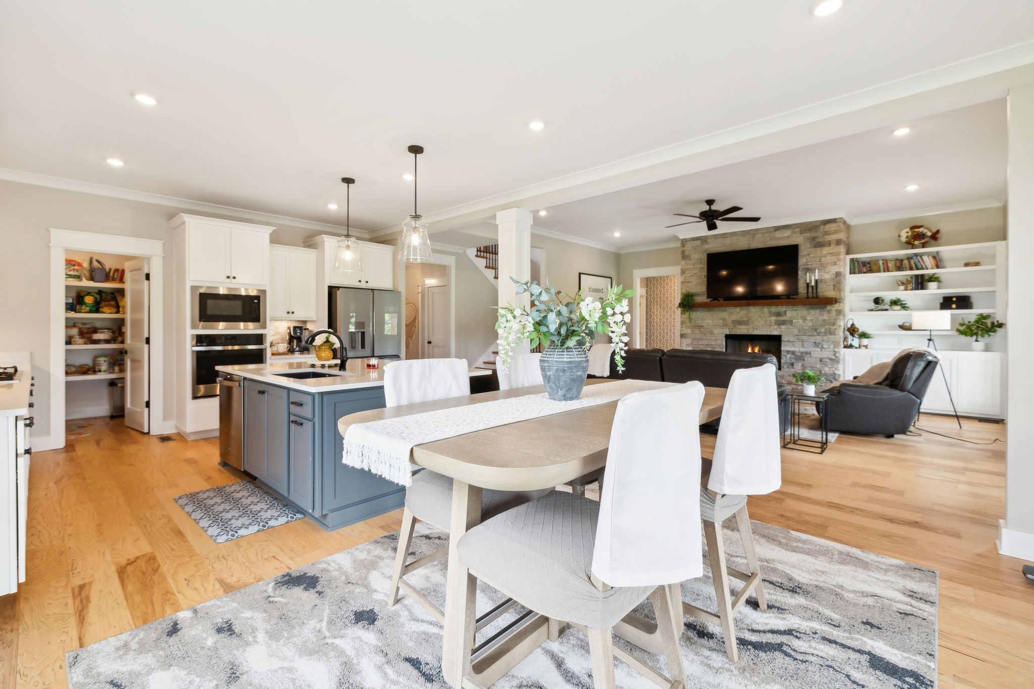 11769 Milton Street Milton, TN 37118 - Photo 21 of 77 a large kitchen with a table and chairs in it
