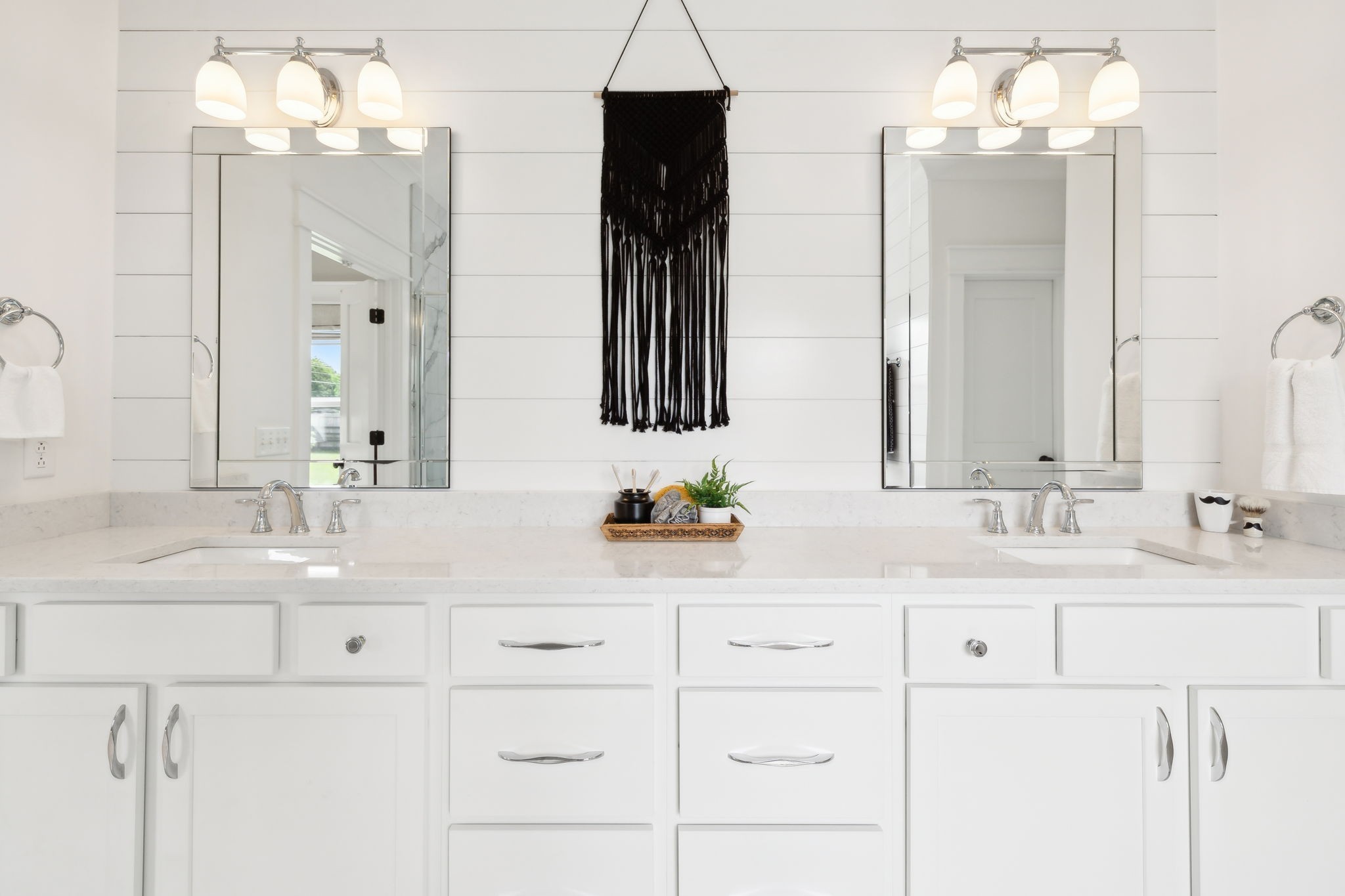 11769 Milton Street Milton, TN 37118 - Photo 28 of 77 a bathroom with double vanity and a mirror