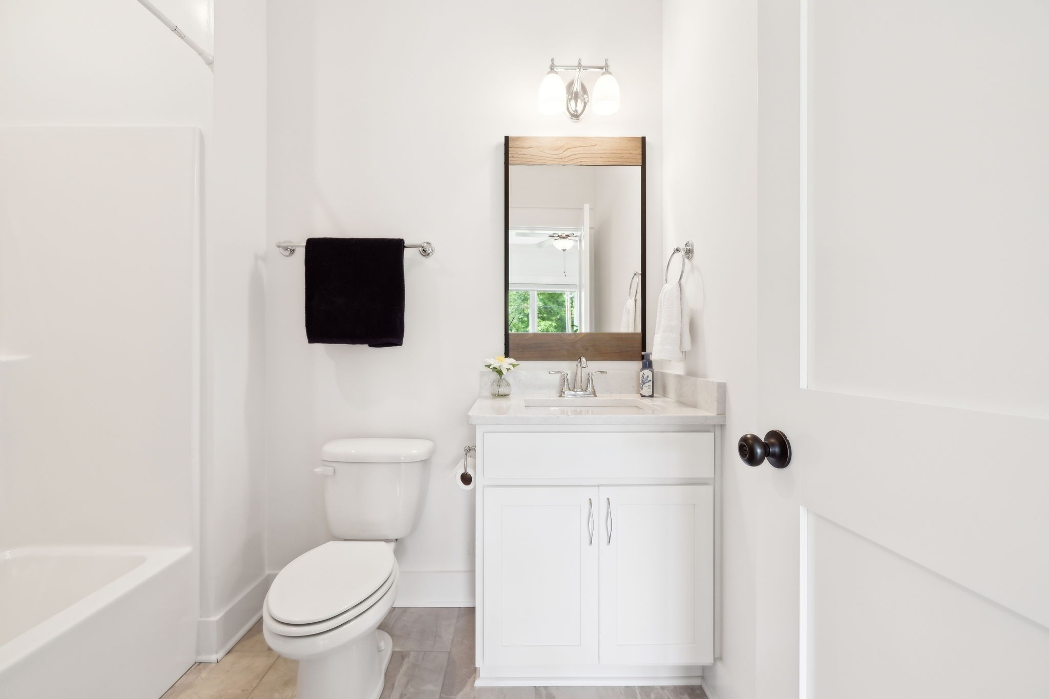 11769 Milton Street Milton, TN 37118 - Photo 35 of 77 a bathroom with a toilet sink and mirror