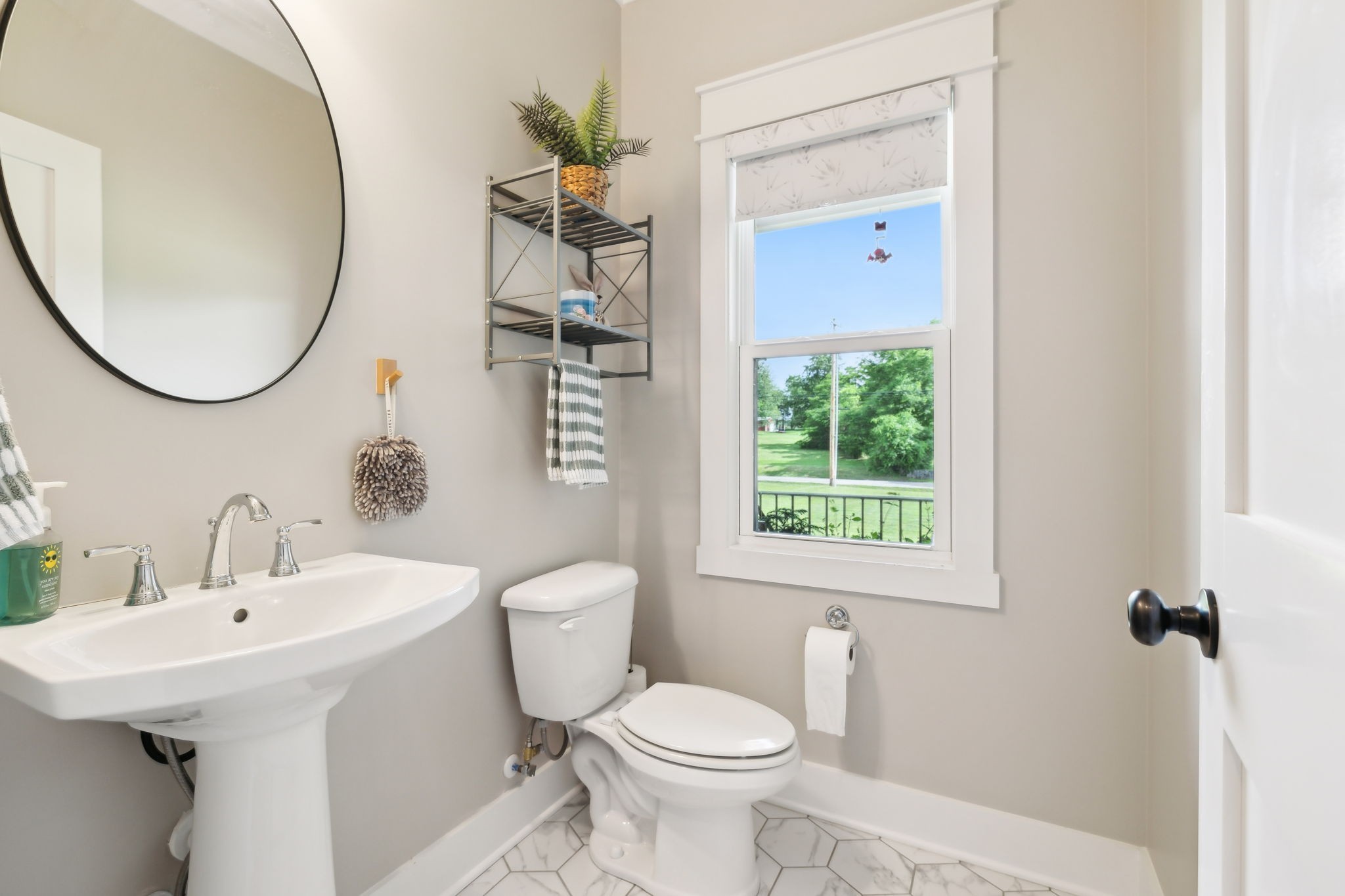 11769 Milton Street Milton, TN 37118 - Photo 38 of 77 a bathroom with a sink toilet and a mirror