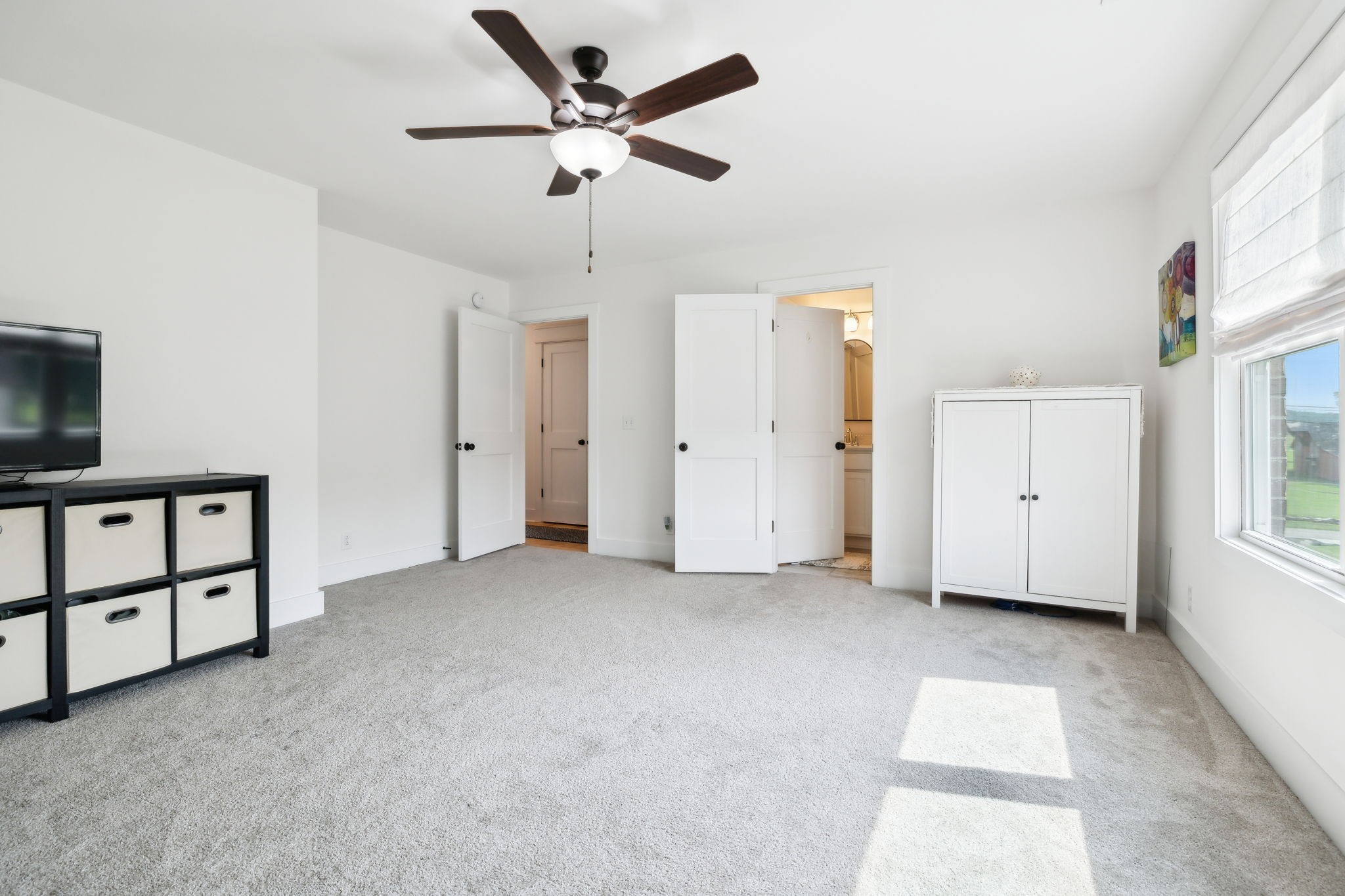 11769 Milton Street Milton, TN 37118 - Photo 48 of 77 an empty room with chandelier fan and windows