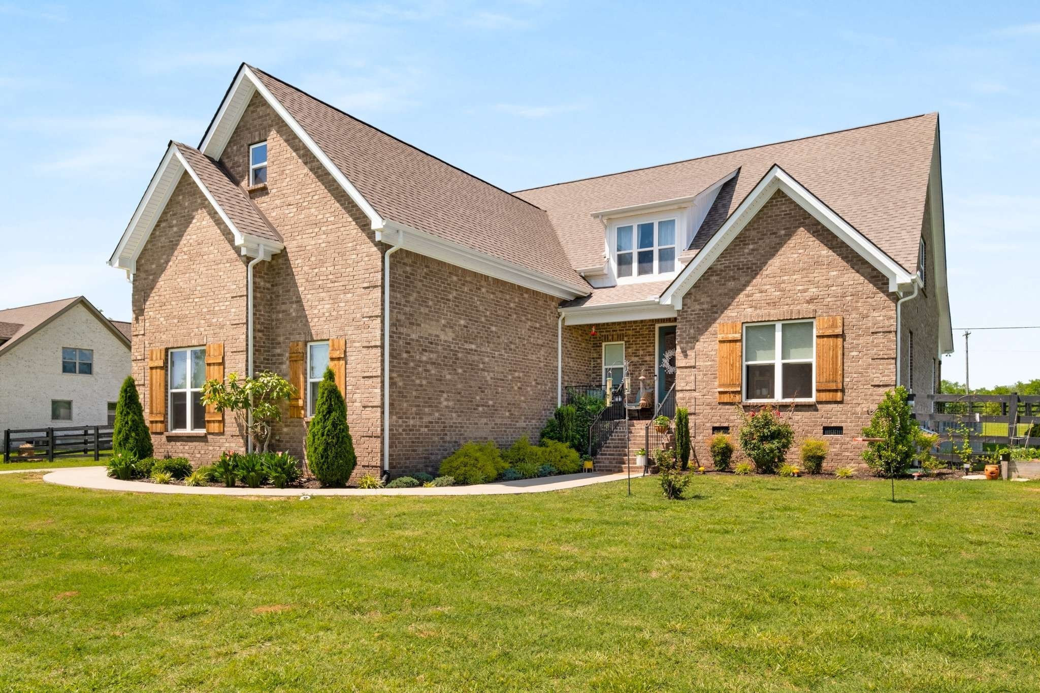11769 Milton Street Milton, TN 37118 - Photo 67 of 77 a front view of a house with garden