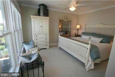 1014 Long Point Road Grasonville, MD 21638 - Photo 12 of 16 a bedroom with furniture and a window