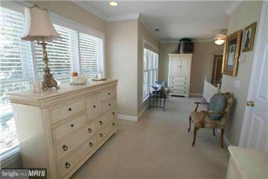 1014 Long Point Road Grasonville, MD 21638 - Photo 13 of 16 a room with furniture and a window