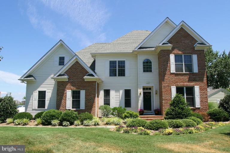 1014 Long Point Road Grasonville, MD 21638 - Photo 5 of 16 front view of a house with a yard