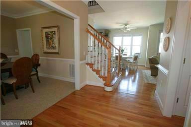 1014 Long Point Road Grasonville, MD 21638 - Photo 6 of 16 a living room with furniture and a wooden floor