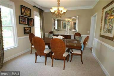 1014 Long Point Road Grasonville, MD 21638 - Photo 7 of 16 a view of a dining room with furniture and window
