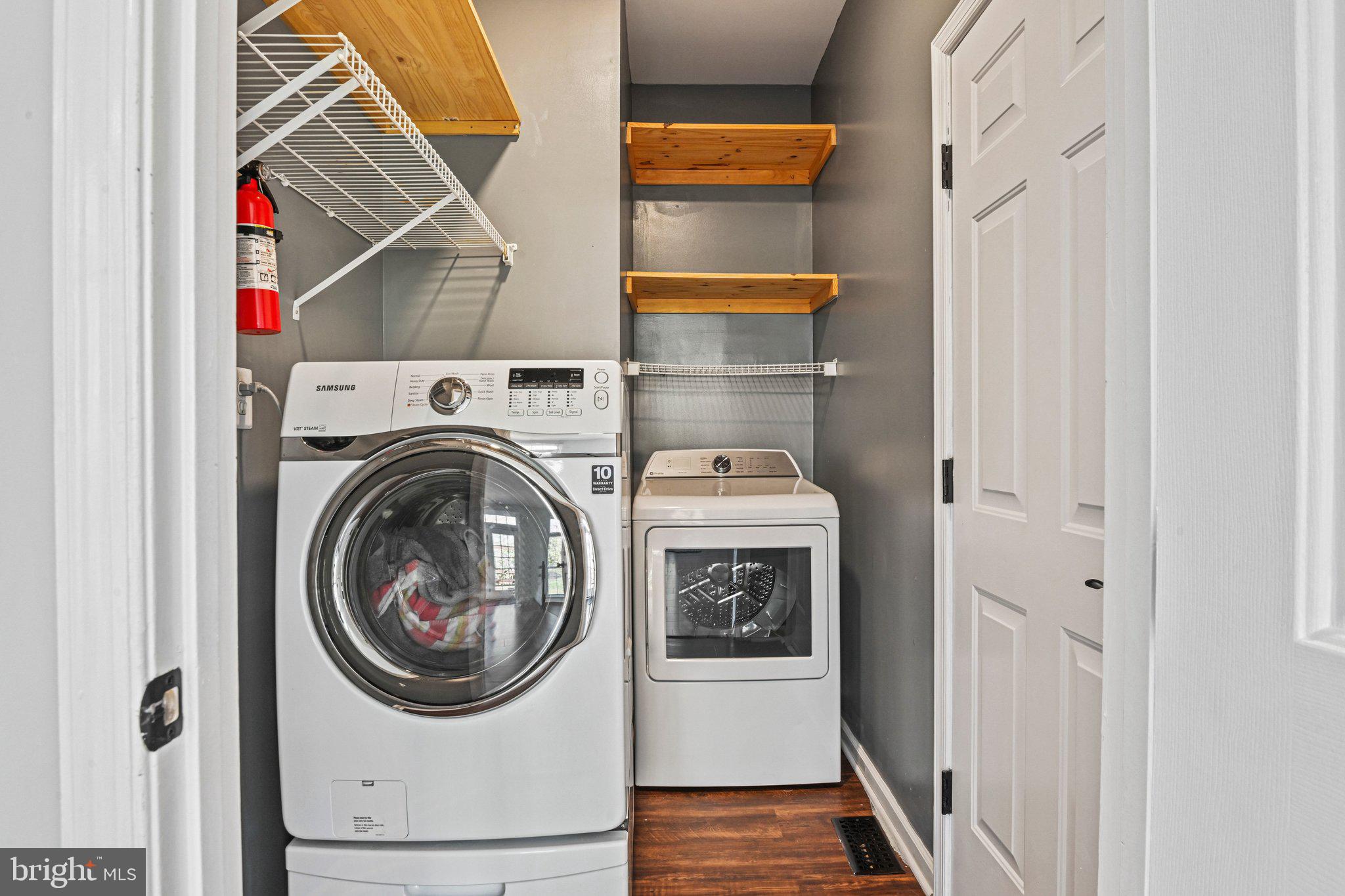 20733 Rainsboro Drive Ashburn, VA 20147 - Photo 21 of 63 a utility room with dryer and washer