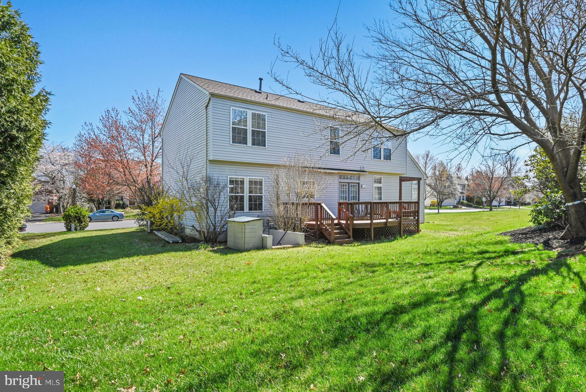 20733 Rainsboro Drive Ashburn, VA 20147 - Photo 26 of 63 a view of a house with a yard and sitting area