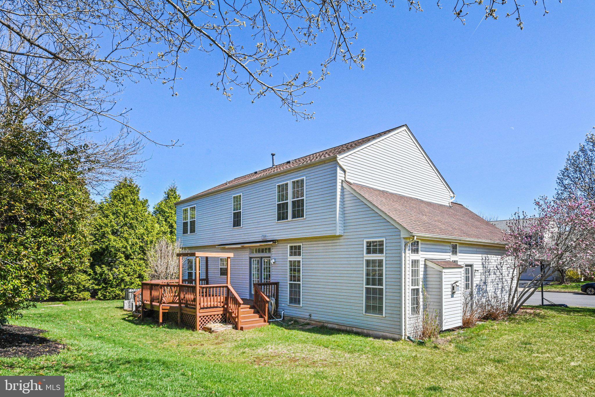 20733 Rainsboro Drive Ashburn, VA 20147 - Photo 28 of 63 a view of a house with a yard