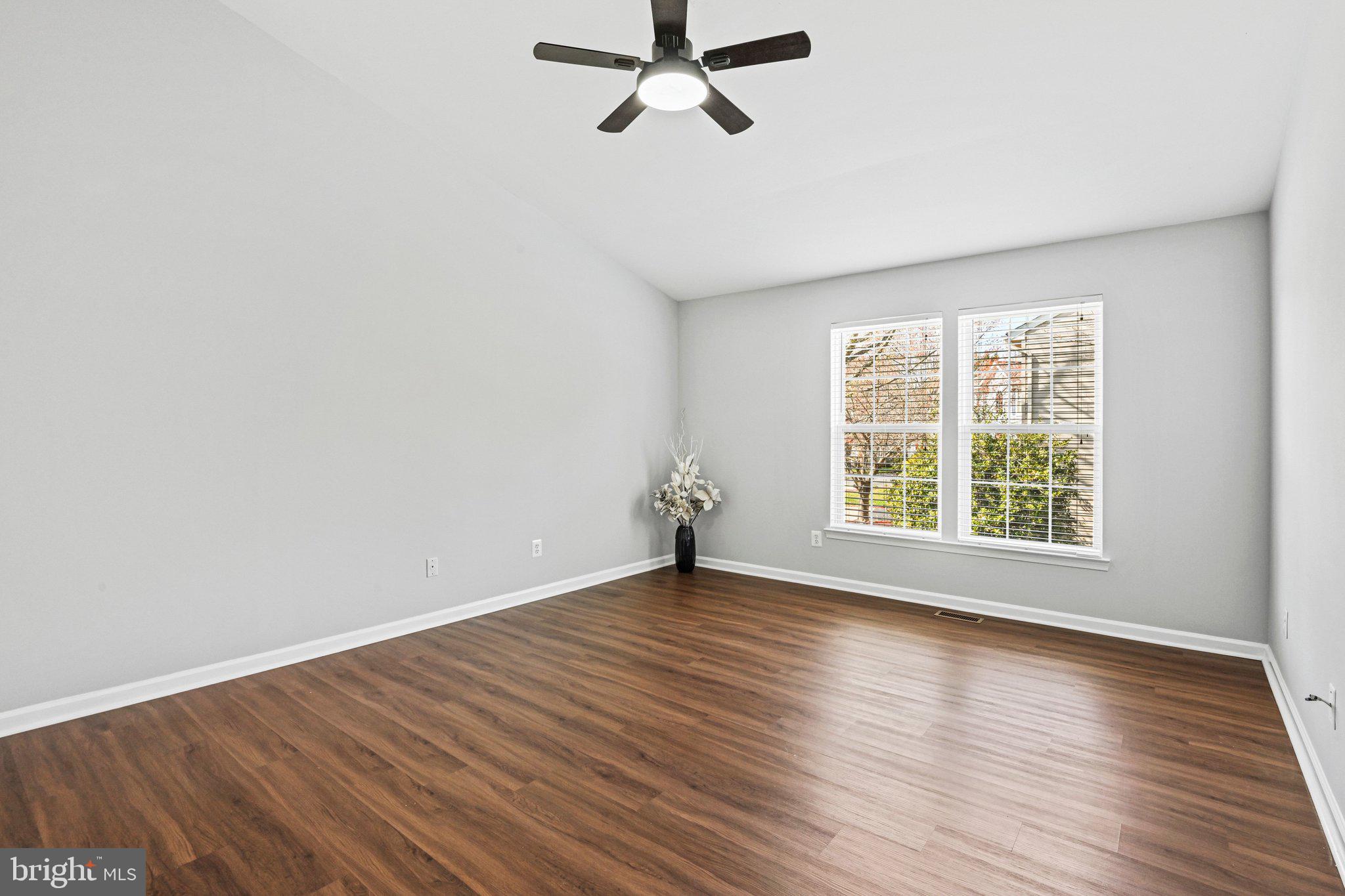 20733 Rainsboro Drive Ashburn, VA 20147 - Photo 30 of 63 wooden floor in an empty room with a window