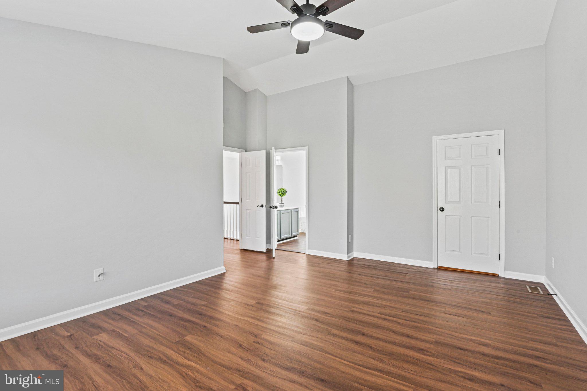 20733 Rainsboro Drive Ashburn, VA 20147 - Photo 32 of 63 a view of an empty room with wooden floor