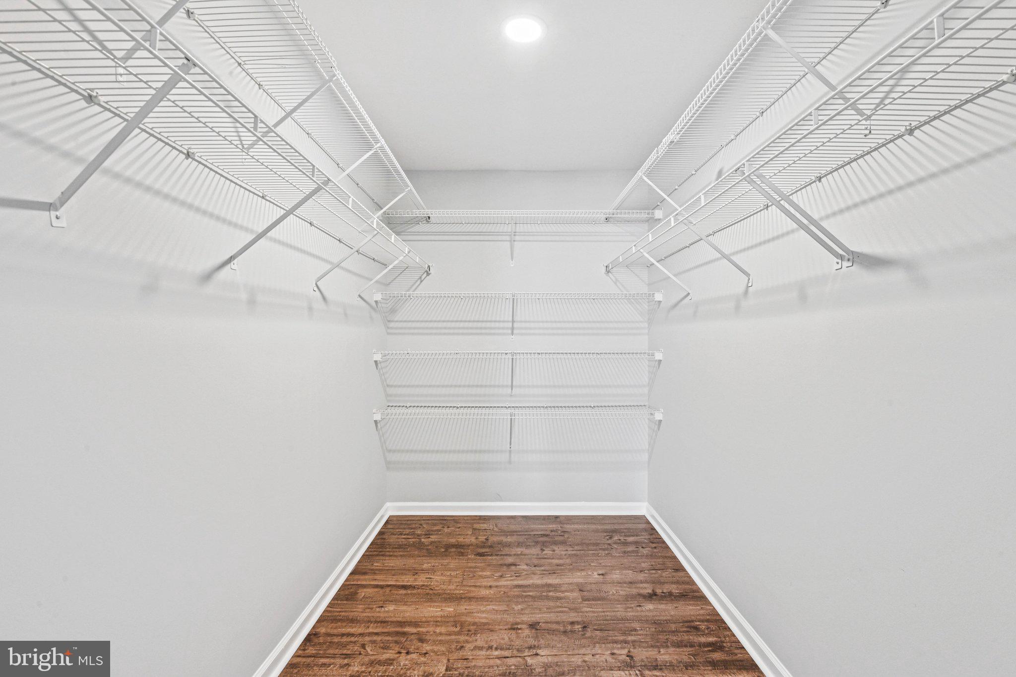 20733 Rainsboro Drive Ashburn, VA 20147 - Photo 33 of 63 a view of a room with racks on the wall