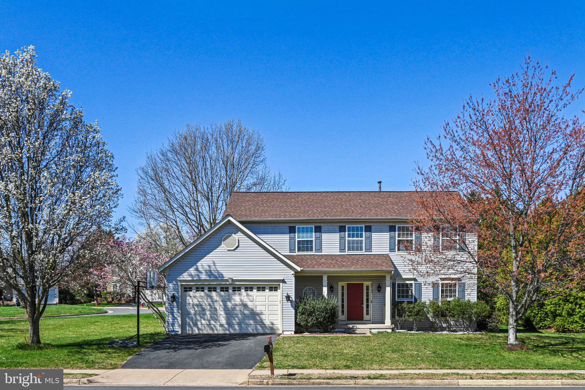 20733 Rainsboro Drive Ashburn, VA 20147 - Photo 4 of 63 a view of house with a yard