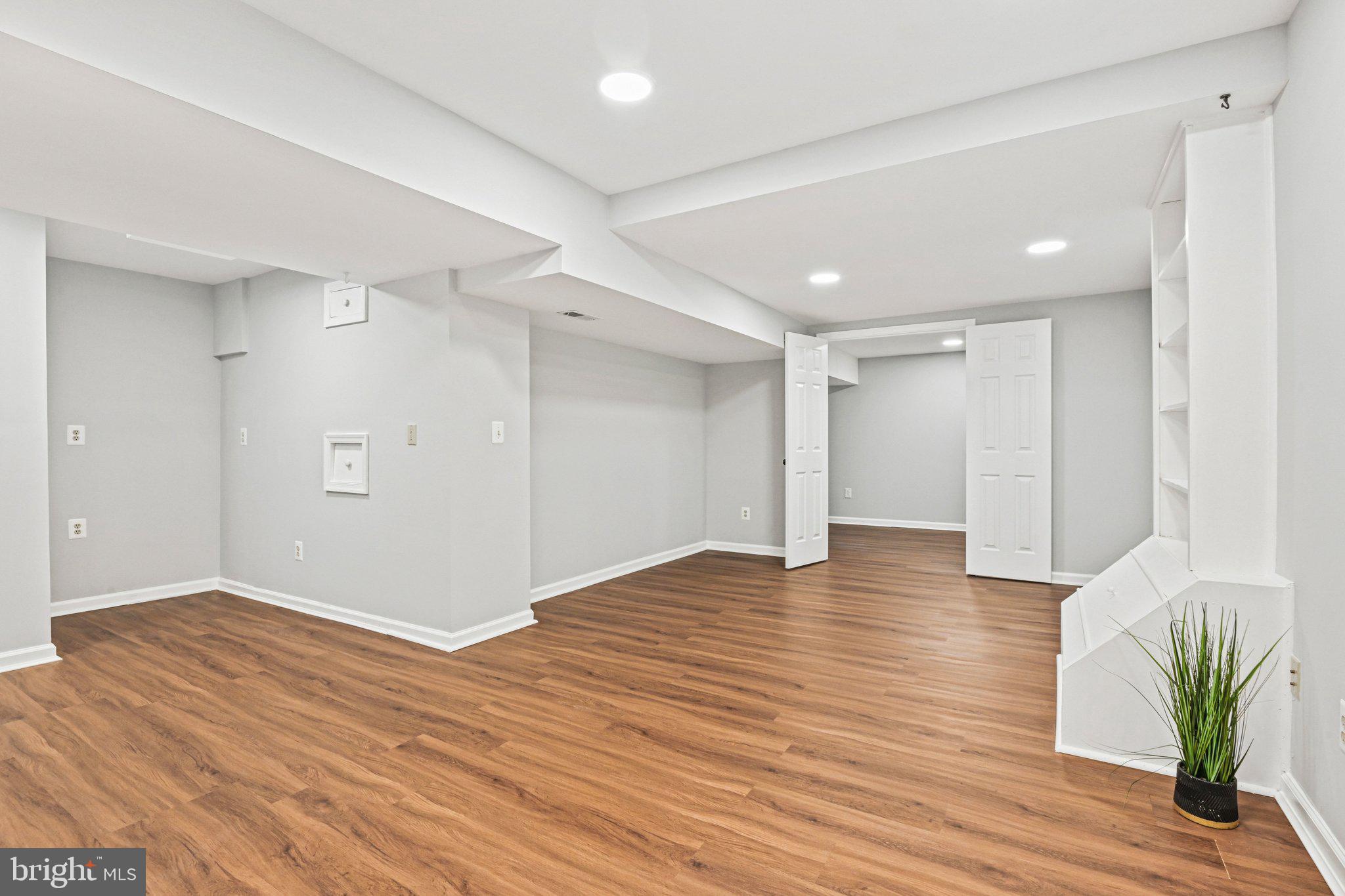 20733 Rainsboro Drive Ashburn, VA 20147 - Photo 53 of 63 a view of empty room with wooden floor