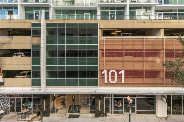 a front view of a building with a street