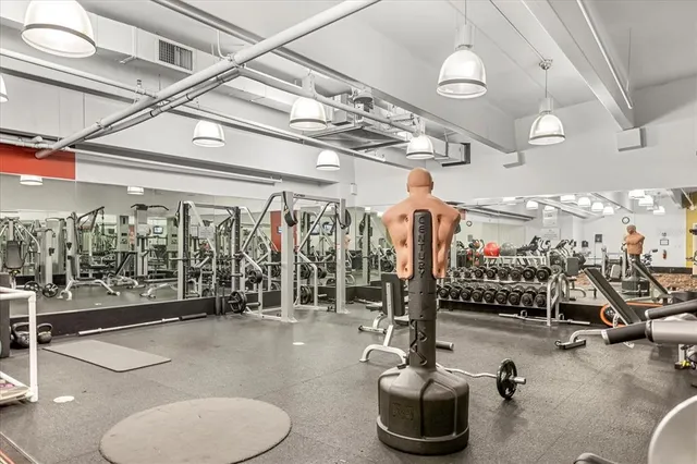 a gym room with gym equipment