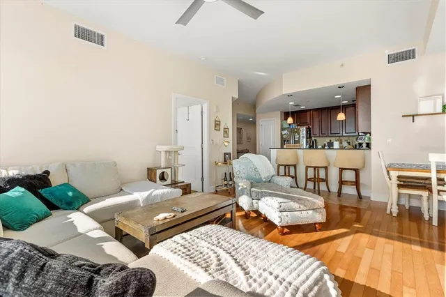 a bedroom with furniture and a rug