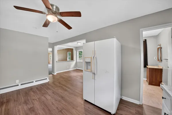 a view of a livingroom with wooden floor