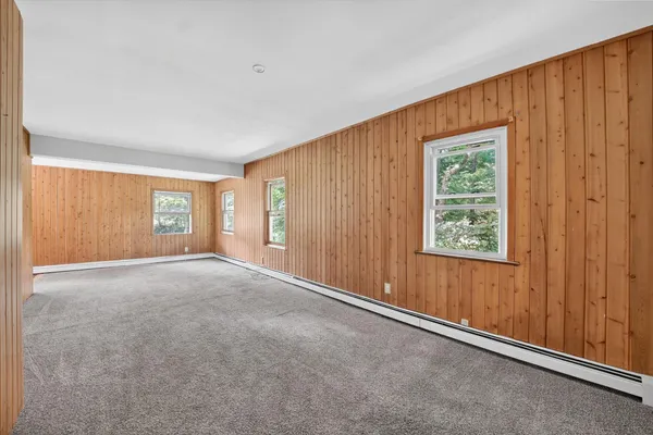 an empty room with windows