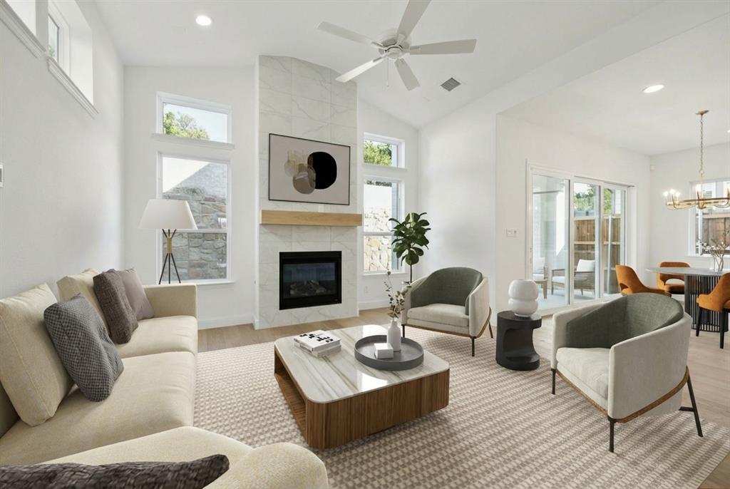 9620 Mav Lane Dallas, TX 75238 - Photo 3 of 11 a living room with furniture and a fireplace