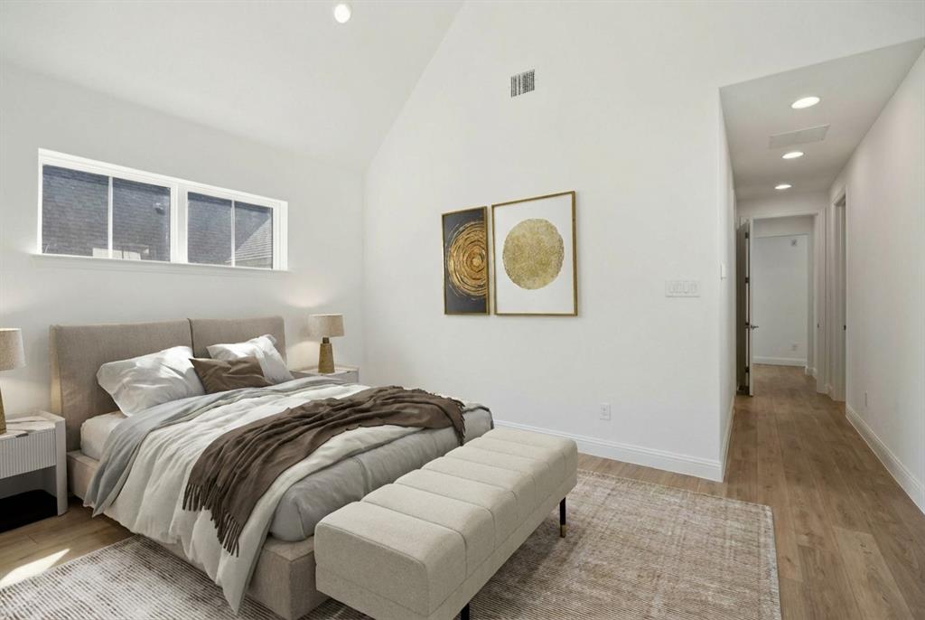 9620 Mav Lane Dallas, TX 75238 - Photo 7 of 11 a bedroom with a bed and painting on the wall