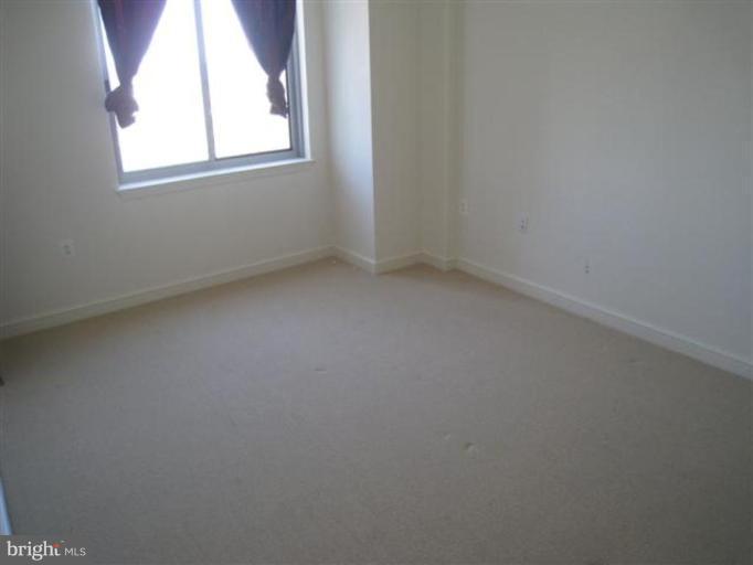 11990 Market Street, Unit 1507 Reston, VA 20190 - Photo 10 of 12 Master Bedroom