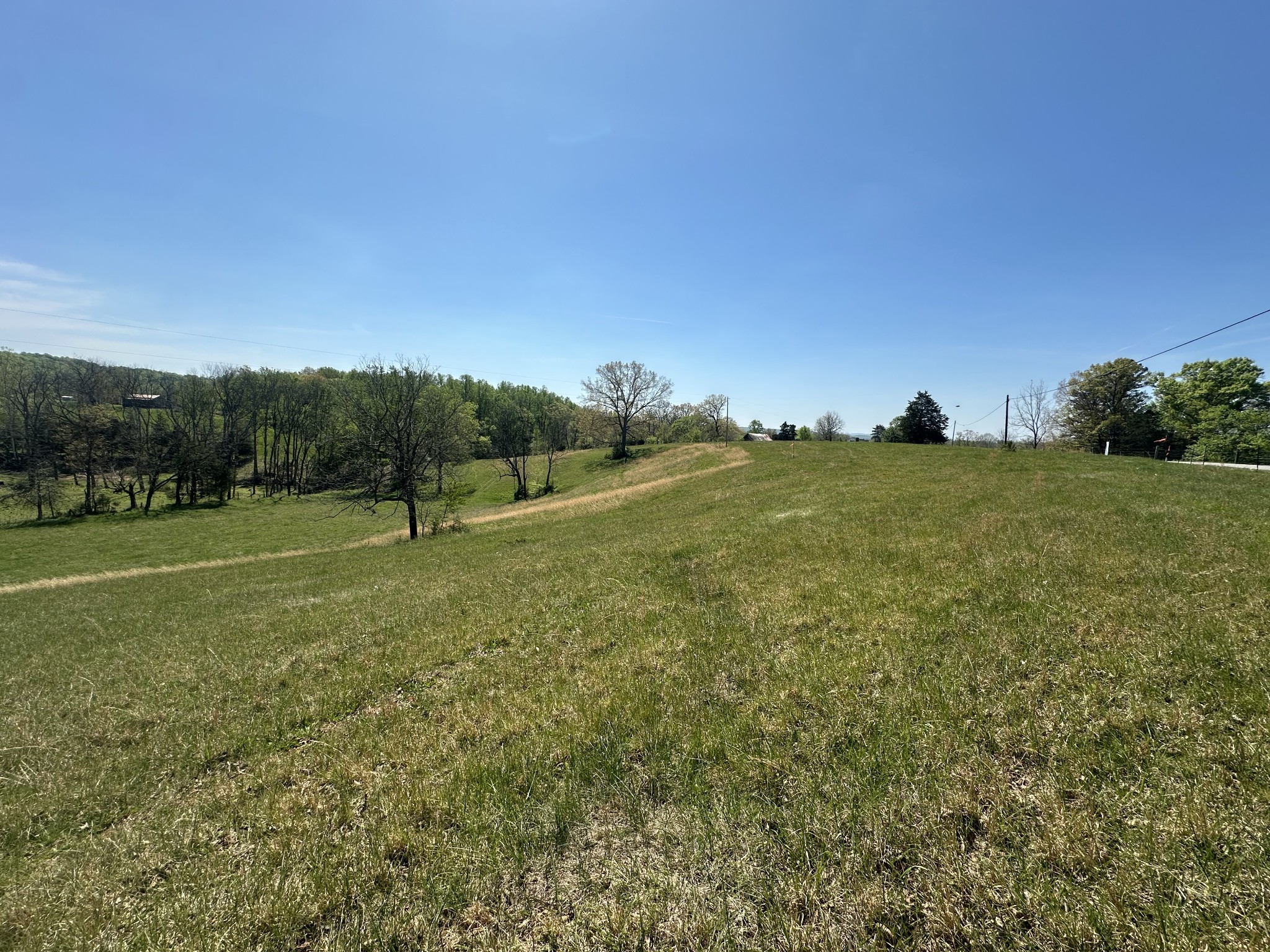 515 Jericho Road Quebeck, TN 38579 - Photo 17 of 21 a view of a field with grass and trees