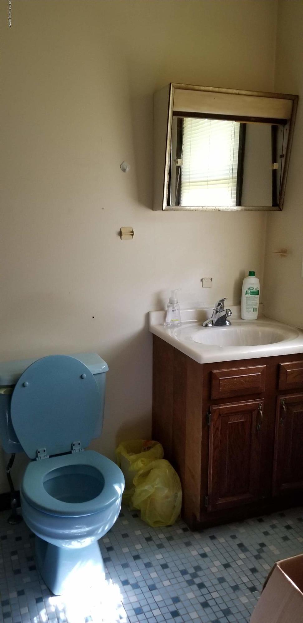 3401 Walnut Road Kunkletown, PA 18058 - Photo 17 of 25 a bathroom with a sink a toilet and vanity