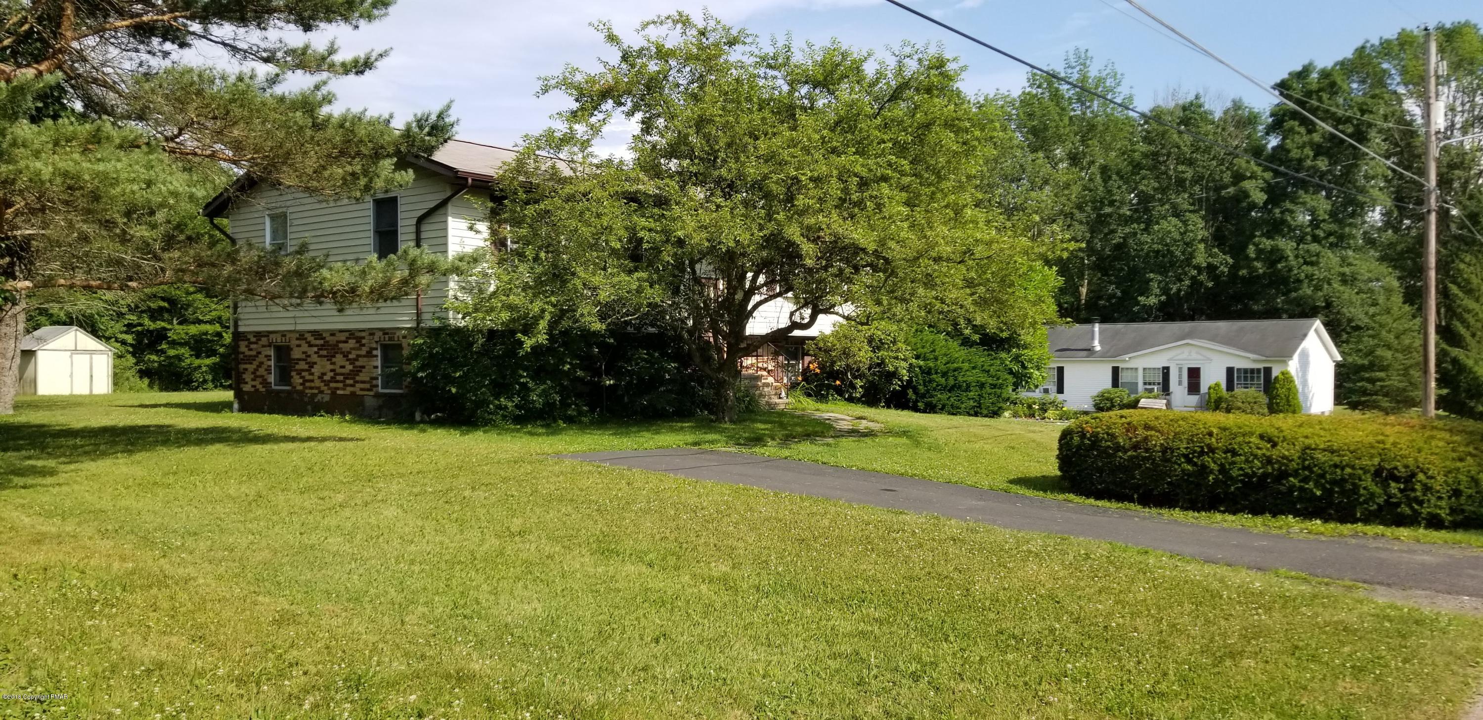 3401 Walnut Road Kunkletown, PA 18058 - Photo 4 of 25 a front view of a house with a yard