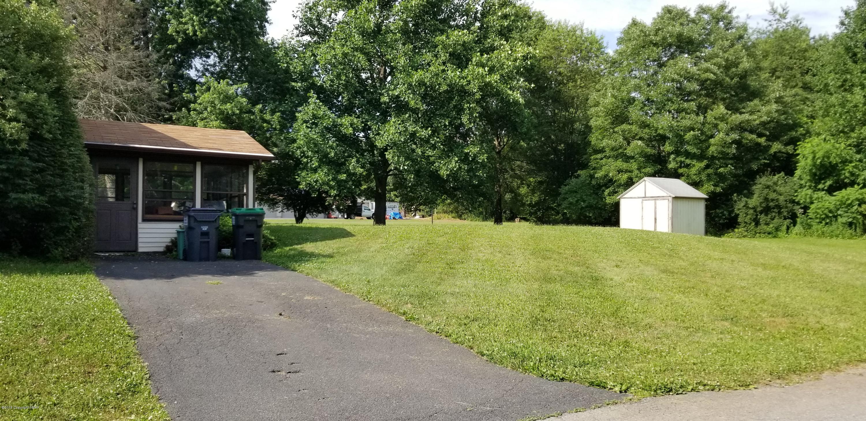 3401 Walnut Road Kunkletown, PA 18058 - Photo 7 of 25 a view of a house with backyard and a garden