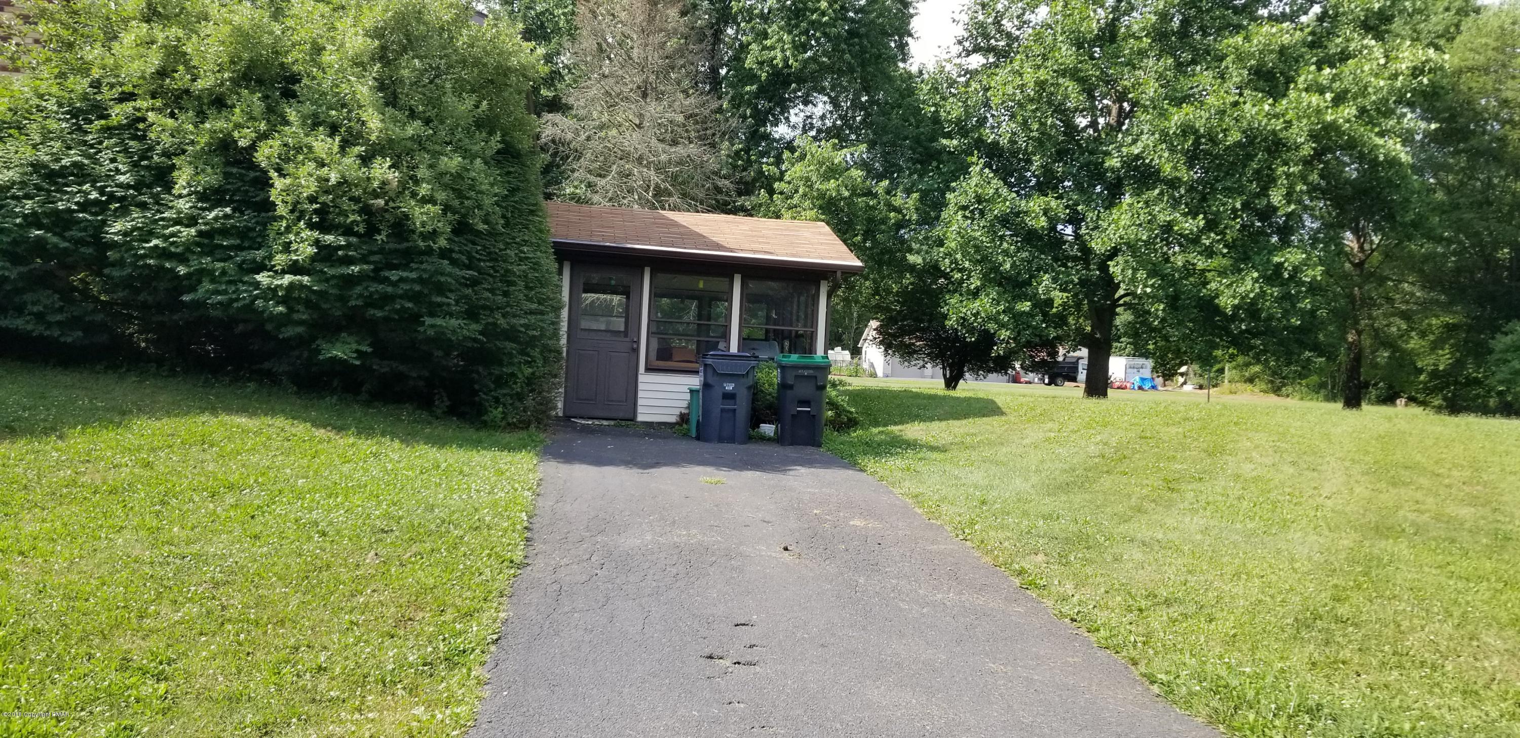 3401 Walnut Road Kunkletown, PA 18058 - Photo 10 of 25 a view of a house with backyard and a garden