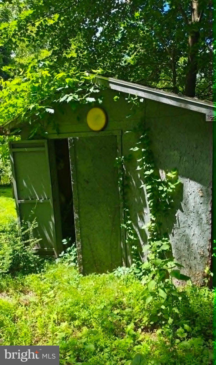 439 Trevorton Road Trevorton, PA 17881 - Photo 75 of 79 Nature's embrace on a forgotten shed.