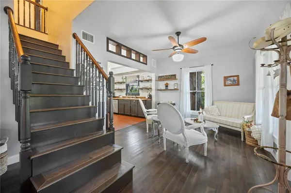 a large kitchen with cabinets and stainless steel appliances