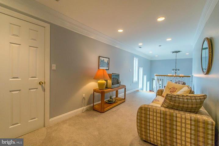 1060 French Road Shenandoah Junction, WV 25442 - Photo 22 of 30 a bedroom with furniture and a chandelier