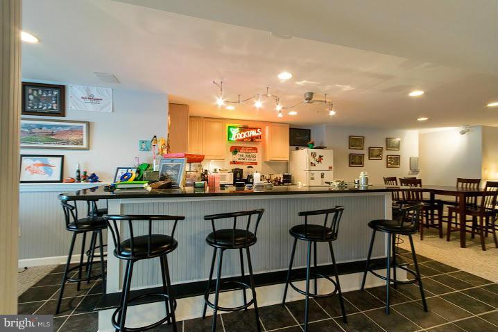 1060 French Road Shenandoah Junction, WV 25442 - Photo 26 of 30 a large kitchen with a table and chairs