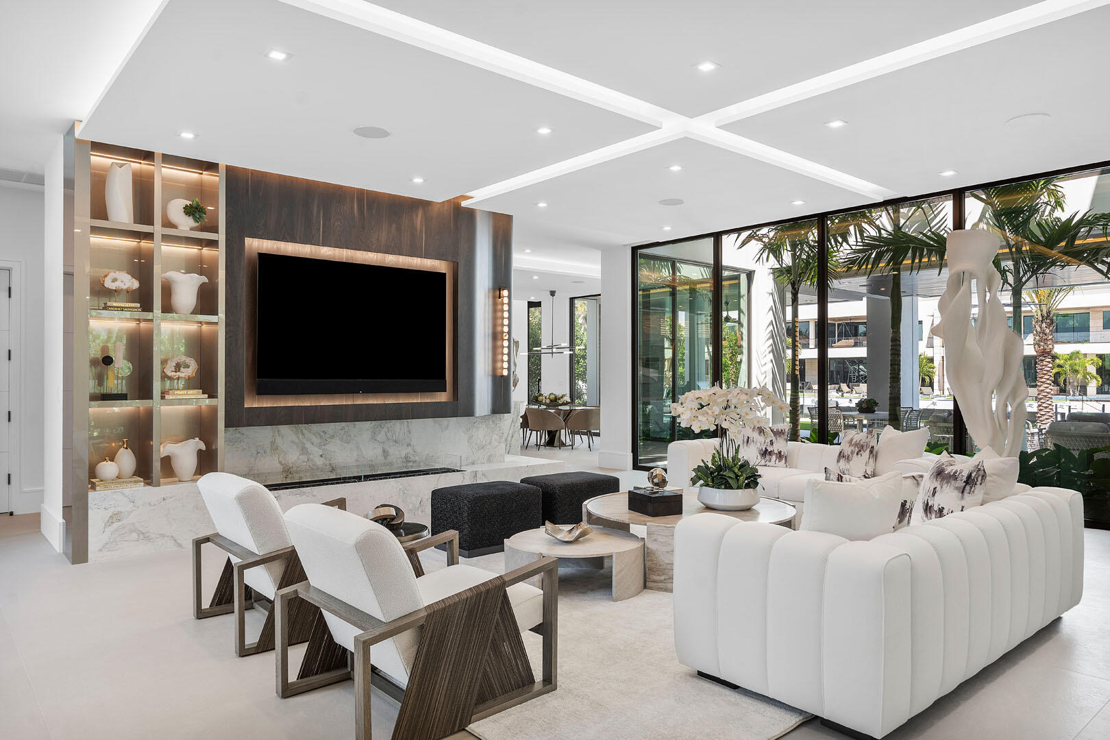 169 Coconut Palm Road Boca Raton, FL 33432 - Photo 11 of 84 a living room with fireplace furniture and a flat screen tv