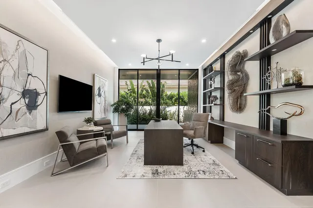 a kitchen with kitchen island granite countertop lots of counter top space and stainless steel appliances