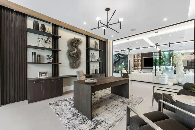a kitchen with stainless steel appliances and white cabinets